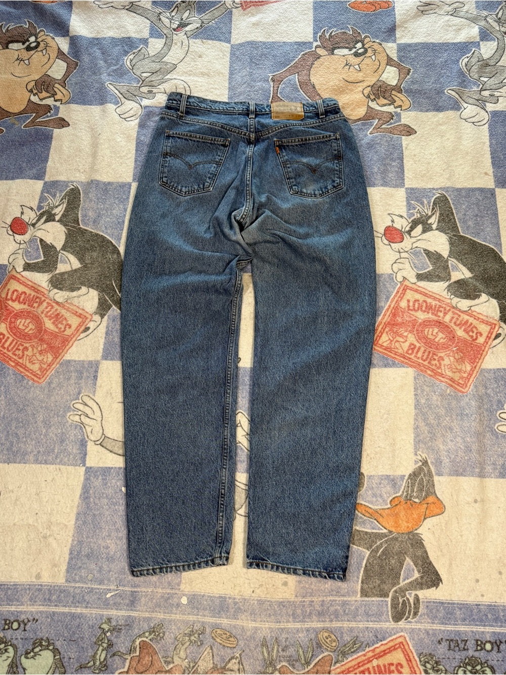 Vintage Levi’s 550 orange tab jeans